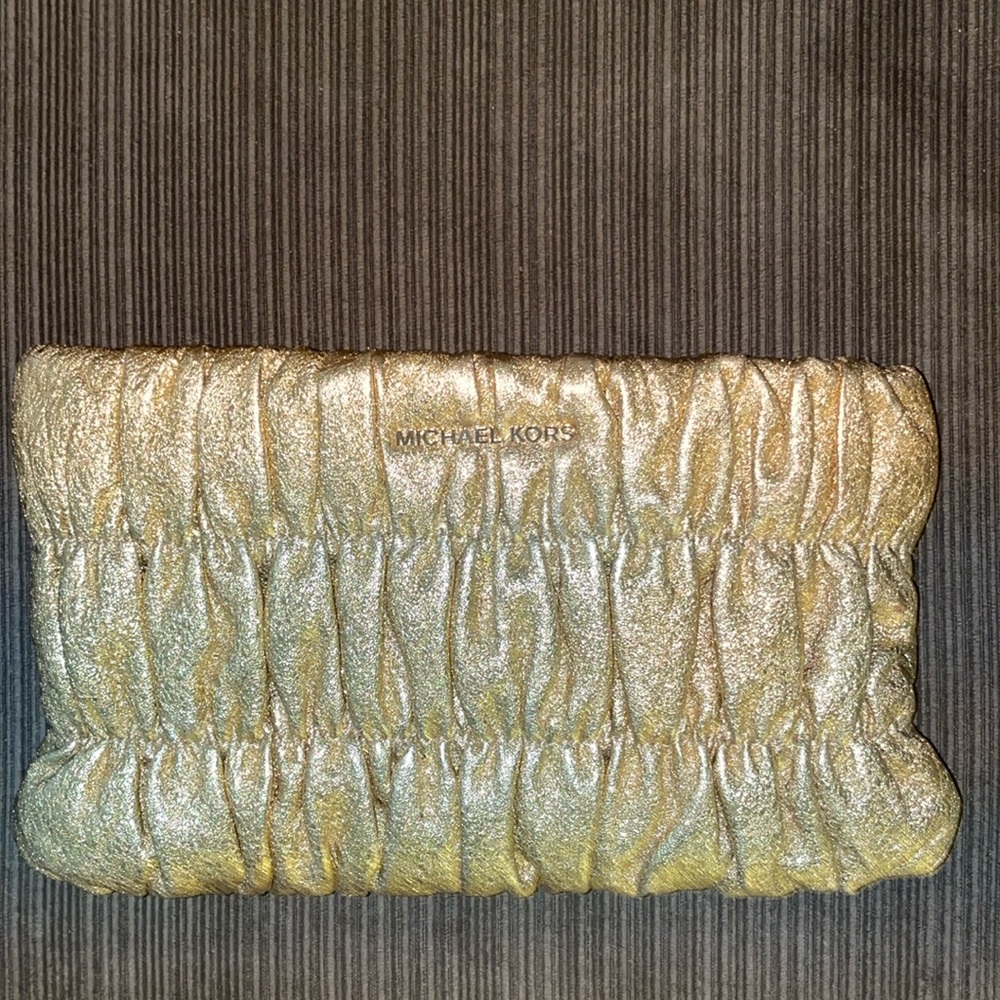 MK gold wristlet